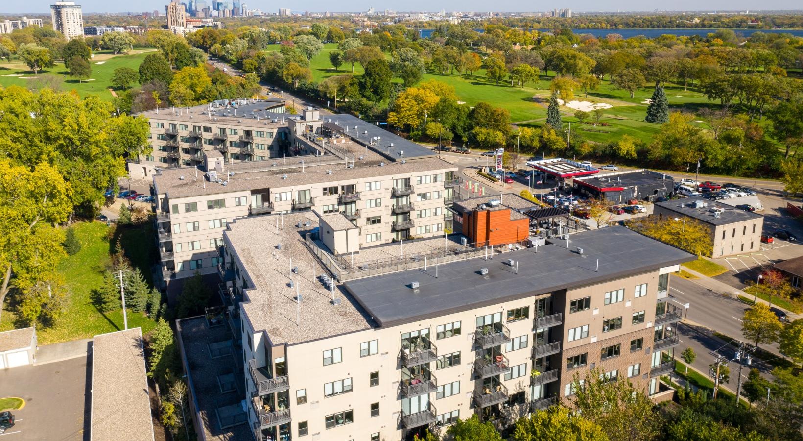 Find your perfect fit at Ellipse on Excelsior a group of buildings with trees in the back