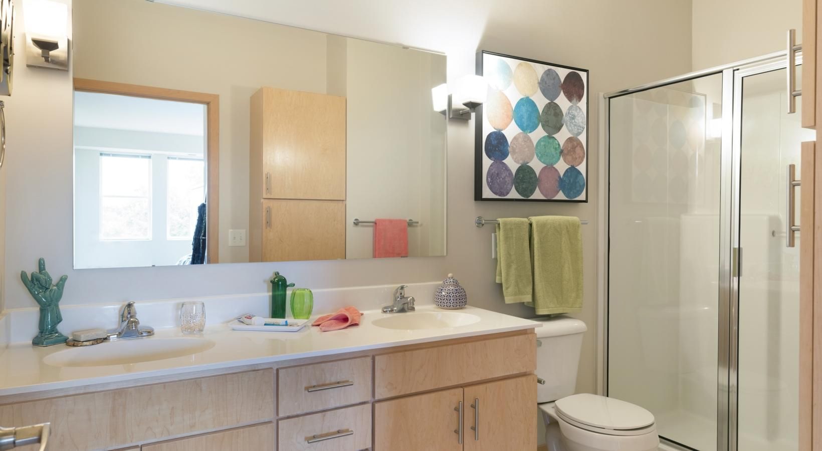 Spacious bathrooms with everything you need a bathroom with a sink toilet and shower