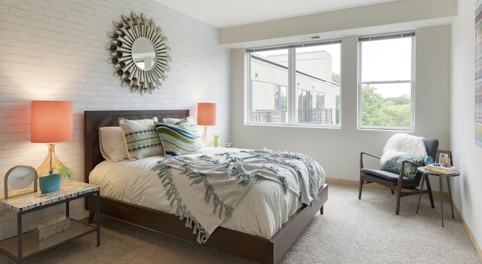 Bedroom options to fit every lifestyle a bedroom with a bed and lamps