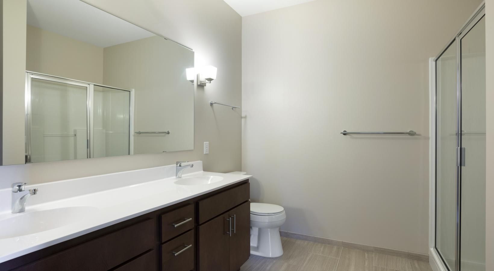 Bathroom options with thoughtful details a bathroom with a sink toilet and shower
